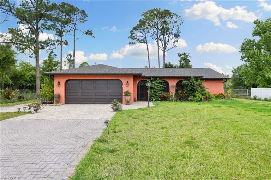 607 GREENWOOD AVE LEHIGH ACRES, FL 33972