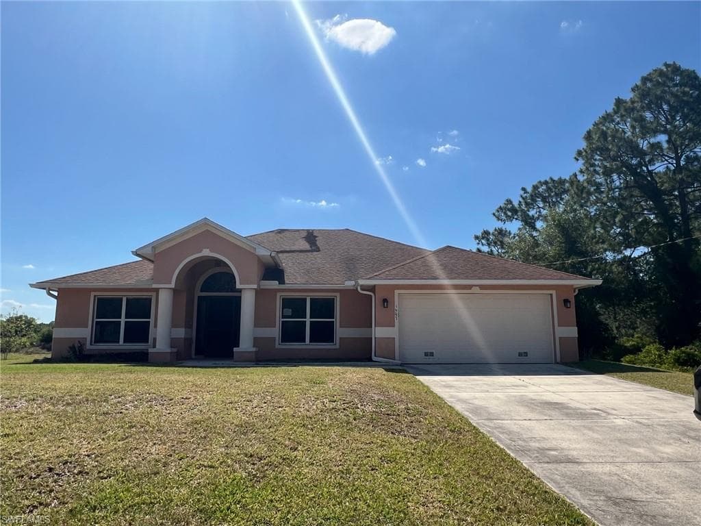 1607 State AVE LEHIGH ACRES, FL 33972