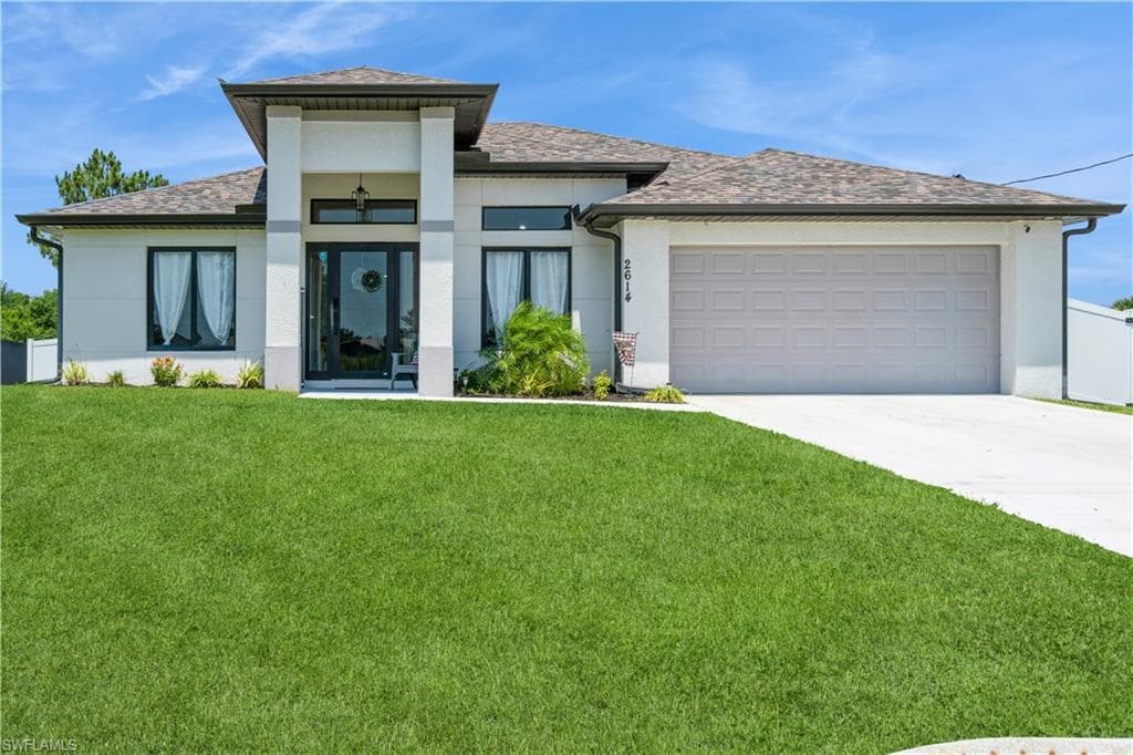 2614 23rd ST W LEHIGH ACRES, FL 33971
