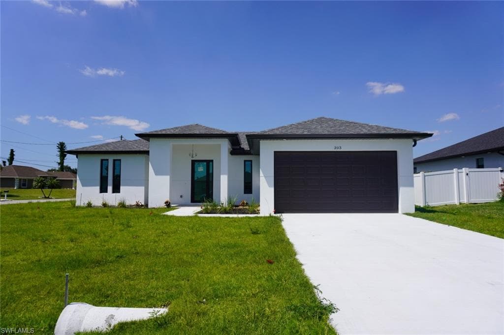303 NE 6th TER CAPE CORAL, FL 33909