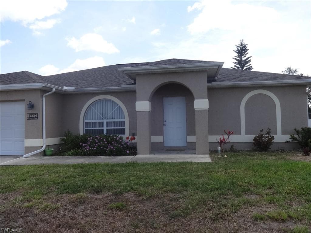 1227 NE 12th PL CAPE CORAL, FL 33909