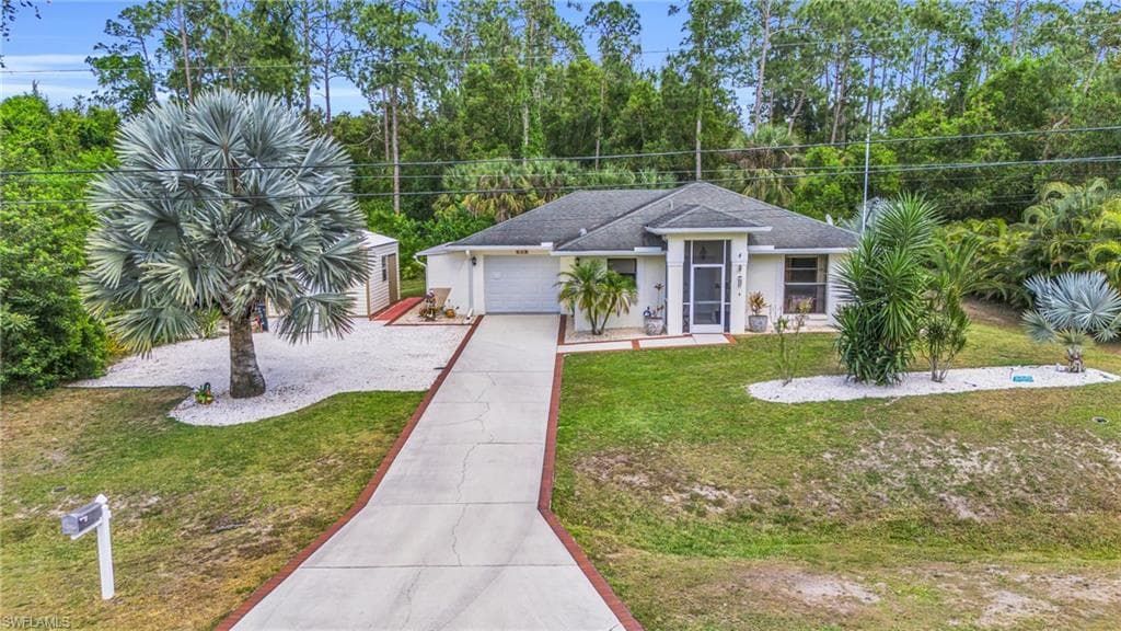 418 Truman AVE LEHIGH ACRES, FL 33972