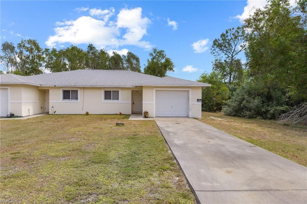 221 Meadow RD LEHIGH ACRES, FL 33973