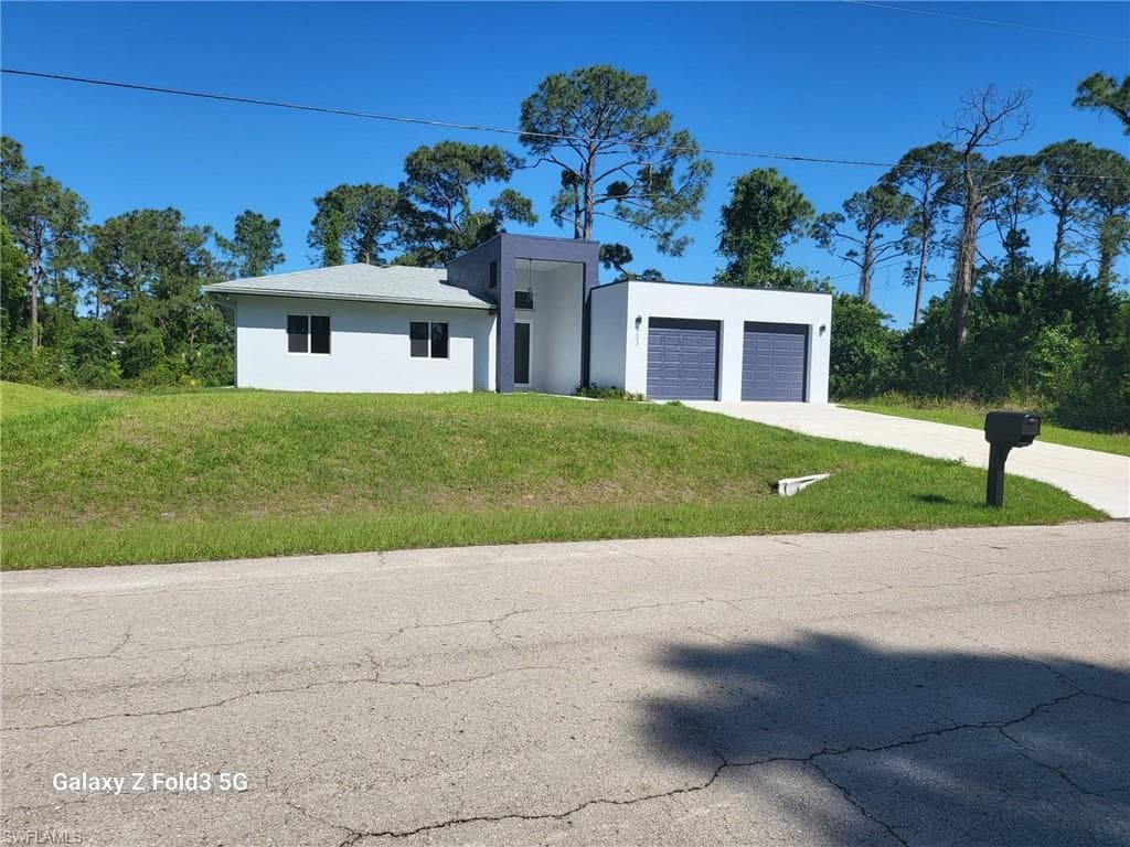 521 Frank Jewett AVE S LEHIGH ACRES, FL 33974