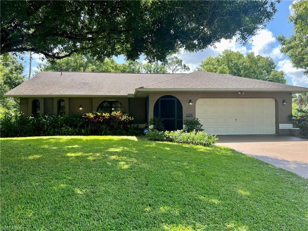 104 Wellington AVE LEHIGH ACRES, FL 33936