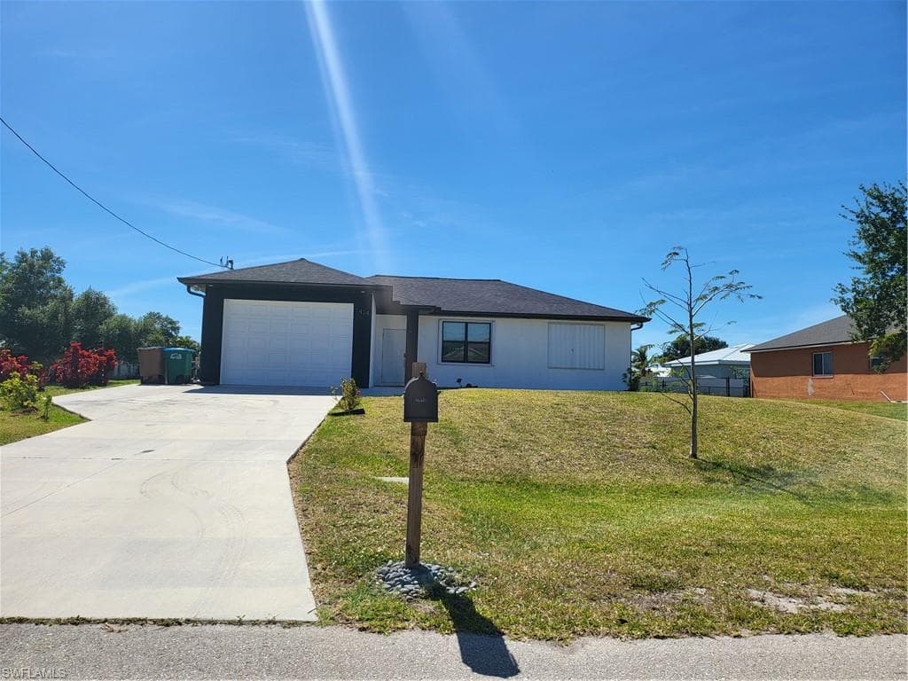 1424 NW 10th AVE CAPE CORAL, FL 33993