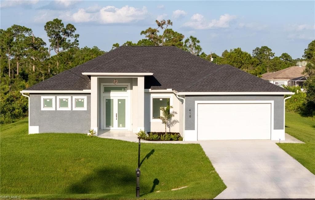 418 Louis AVE LEHIGH ACRES, FL 33972