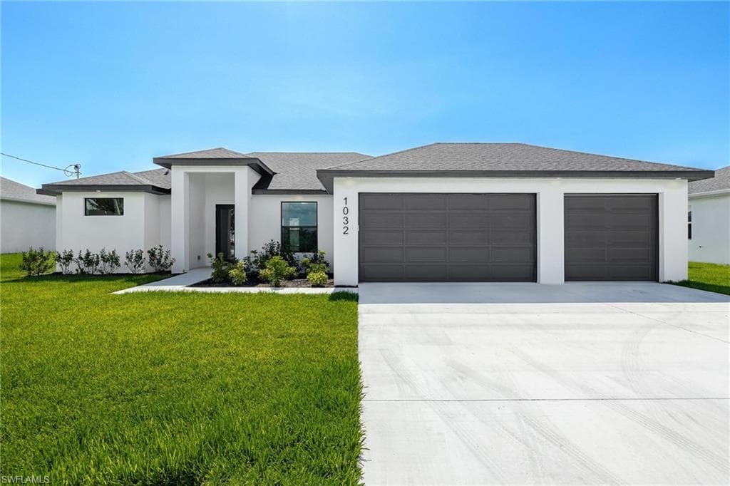 1032 NE 11th AVE CAPE CORAL, FL 33909