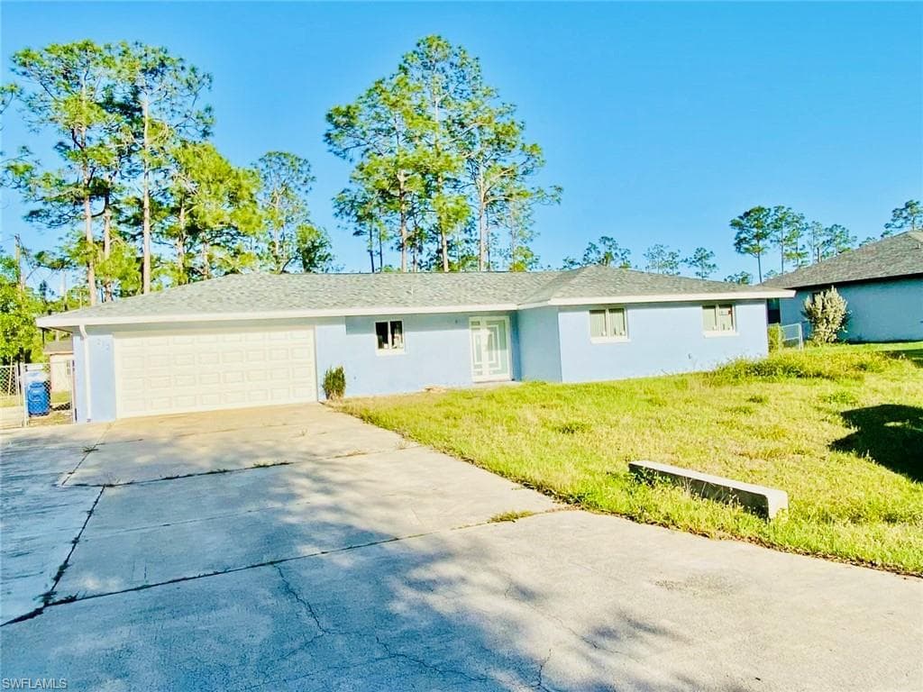 212 Grant AVE LEHIGH ACRES, FL 33936