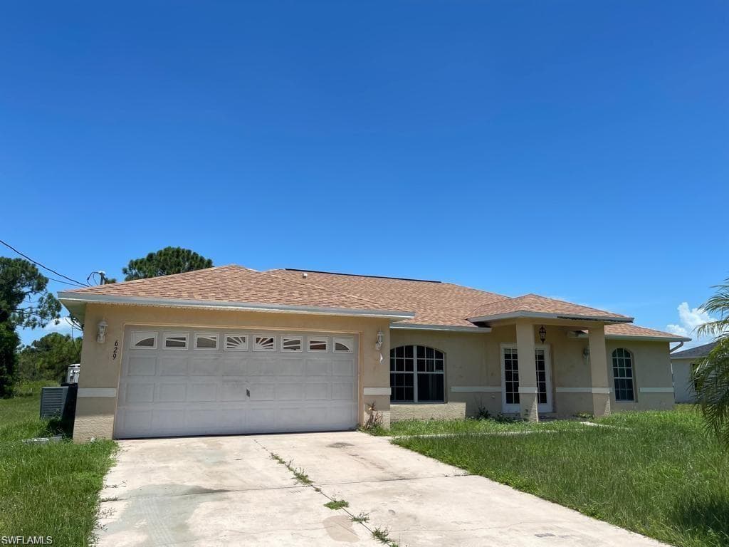 629 Dauphine AVE S LEHIGH ACRES, FL 33974
