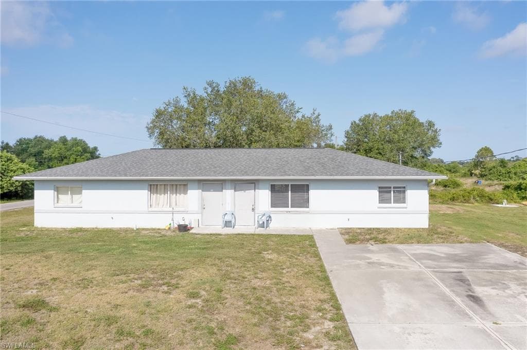 140/142 Gordon AVE S LEHIGH ACRES, FL 33973