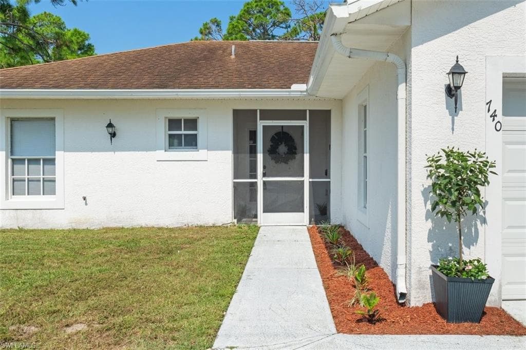 740 Oro AVE S LEHIGH ACRES, FL 33974
