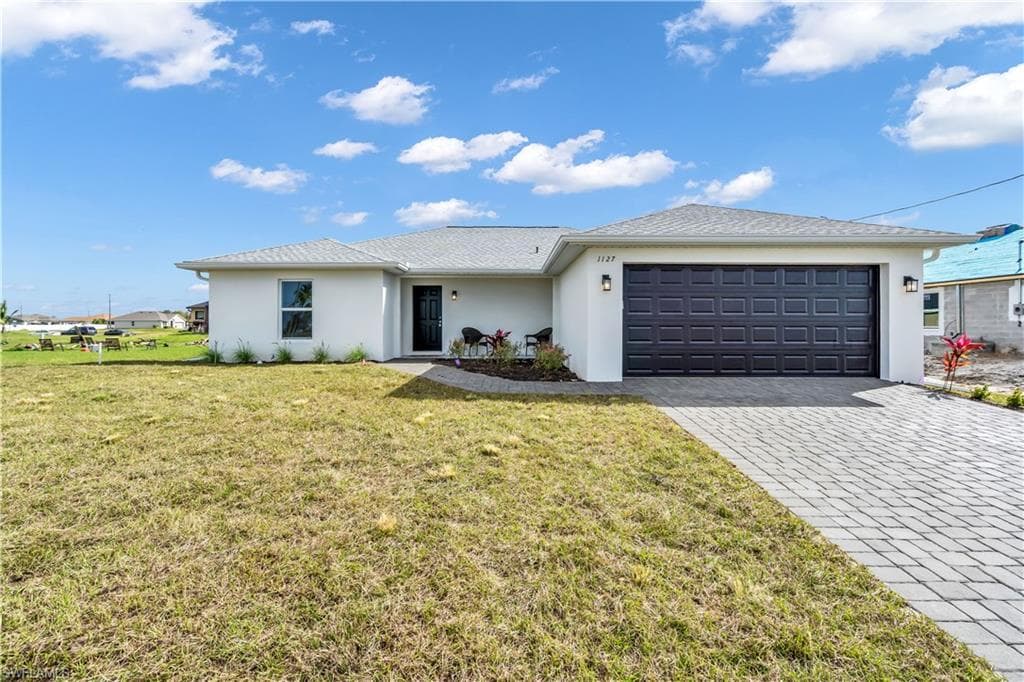 1127 NW 12th PL CAPE CORAL, FL 33993