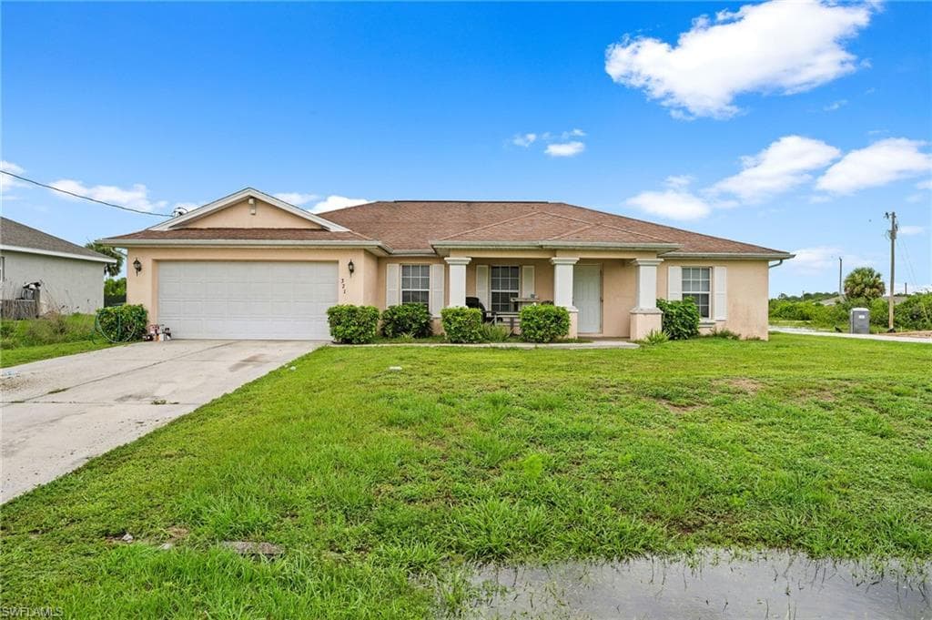 371 Portage AVE LEHIGH ACRES, FL 33974