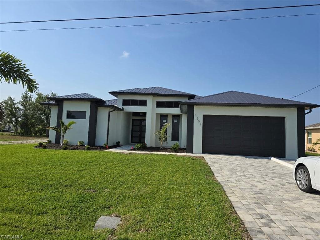 1209 SW 13th ST CAPE CORAL, FL 33991