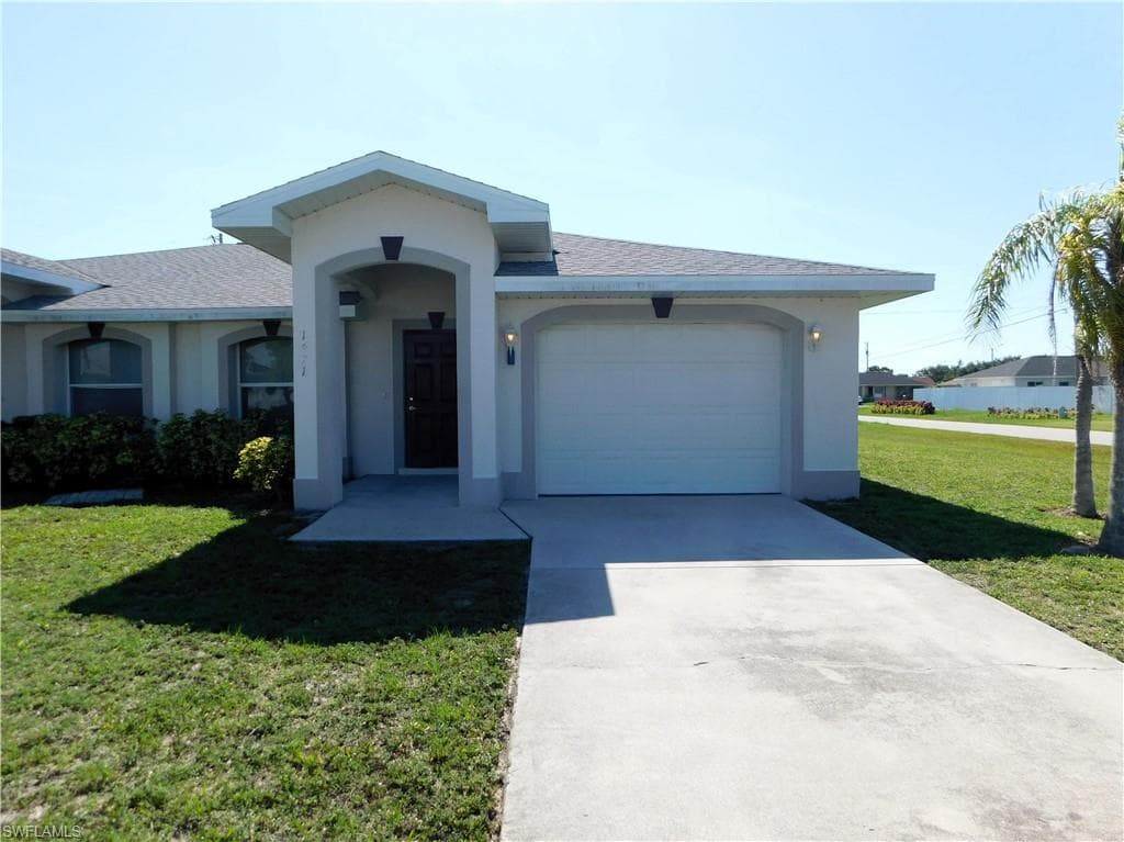 1421 SE 8th AVE CAPE CORAL, FL 33990