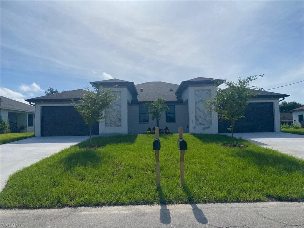 705/707 Harry AVE S LEHIGH ACRES, FL 33973