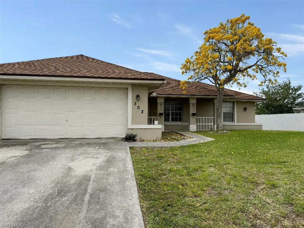 302 NE 9th TER CAPE CORAL, FL 33909