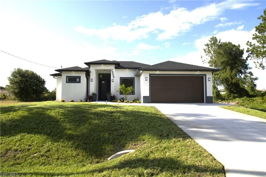 2606 45TH ST W LEHIGH ACRES, FL 33971