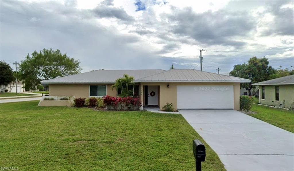 1042 SE 26th TER CAPE CORAL, FL 33904