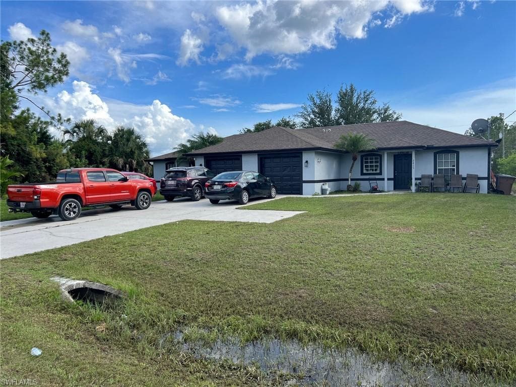 2413/2415 Churchill AVE N LEHIGH ACRES, FL 33971