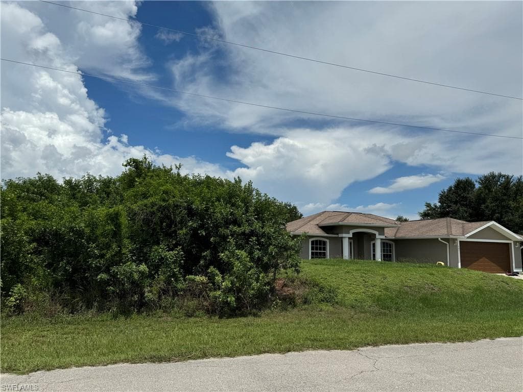 505 Carrillon AVE S LEHIGH ACRES, FL 33974
