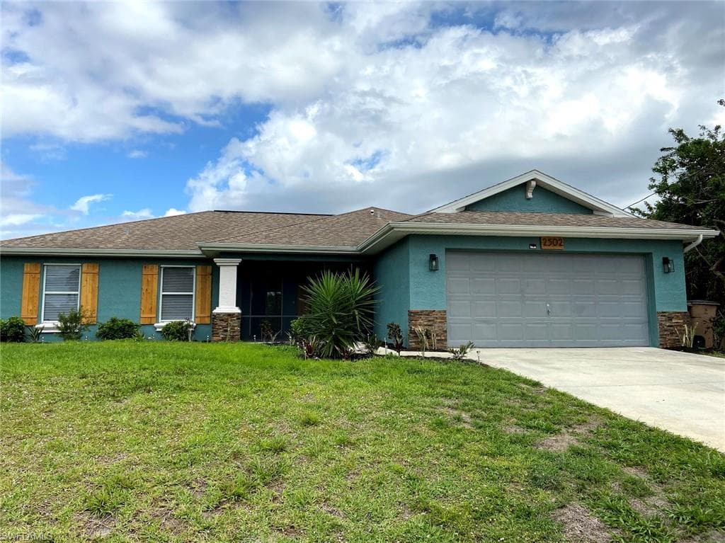 2502 31st ST SW LEHIGH ACRES, FL 33976