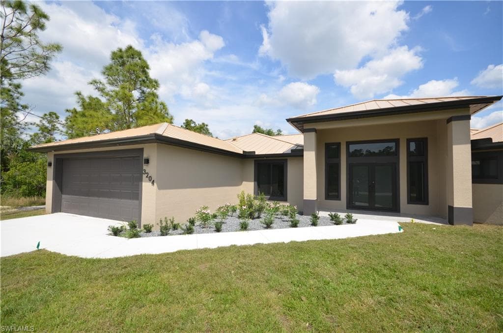 3204 Nora AVE N LEHIGH ACRES, FL 33971