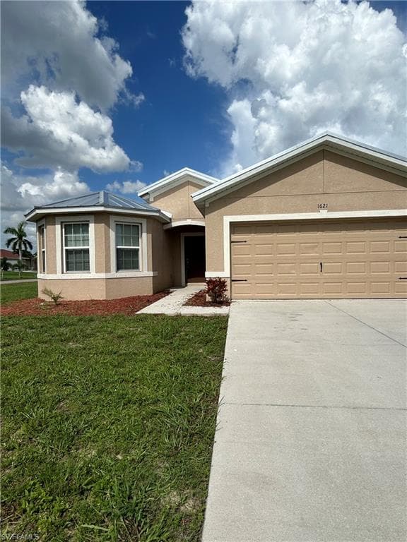 1621 SW 10th AVE CAPE CORAL, FL 33991