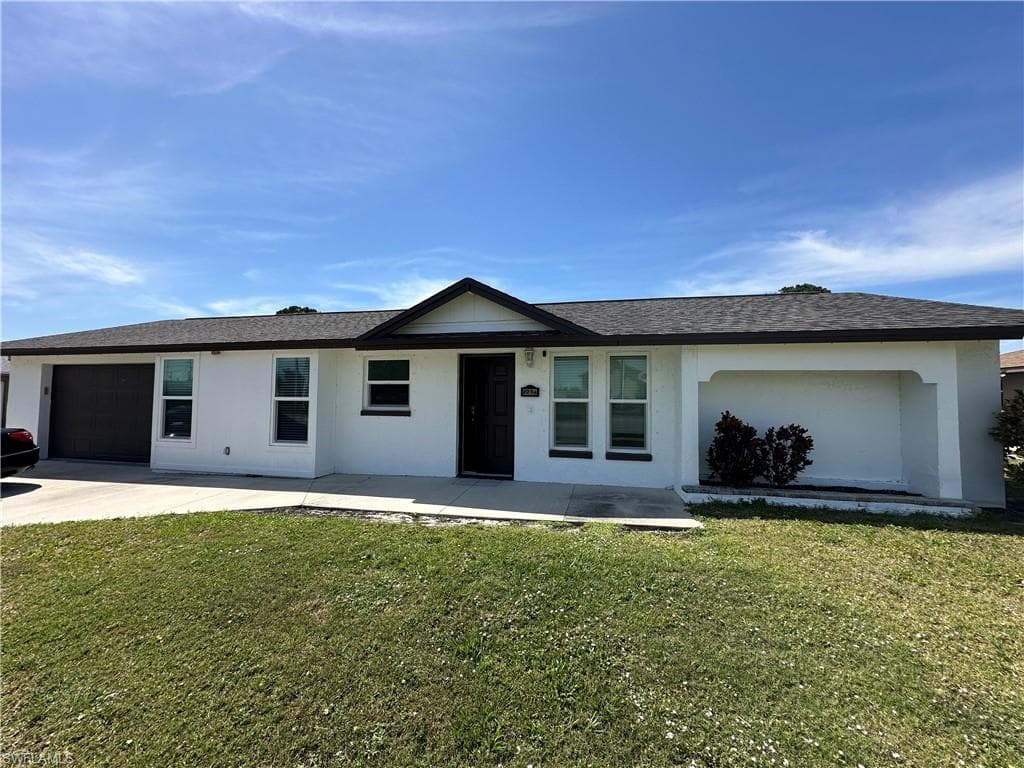 2214 Country Club BLVD CAPE CORAL, FL 33990