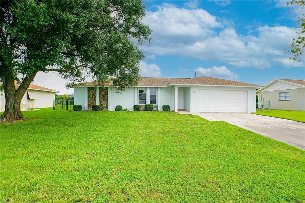 911 SE 19th ST CAPE CORAL, FL 33990