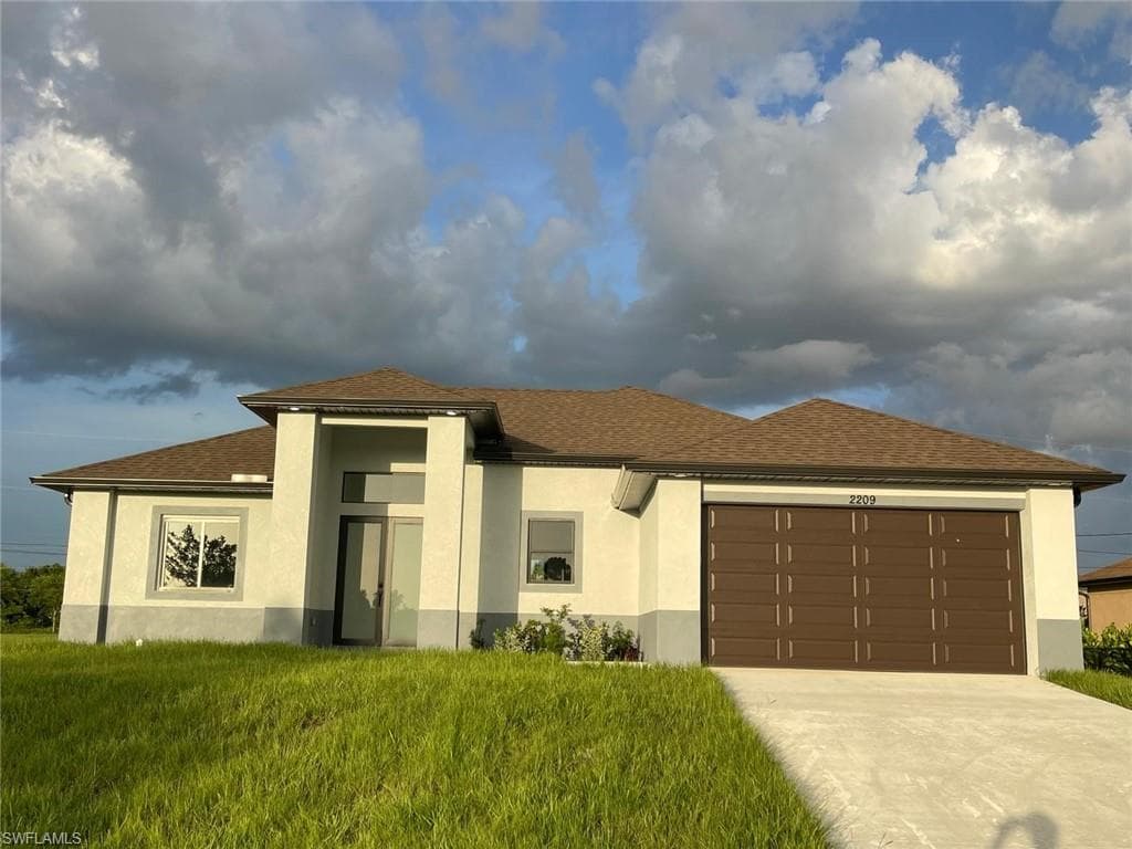 2209 NE 21st AVE CAPE CORAL, FL 33909