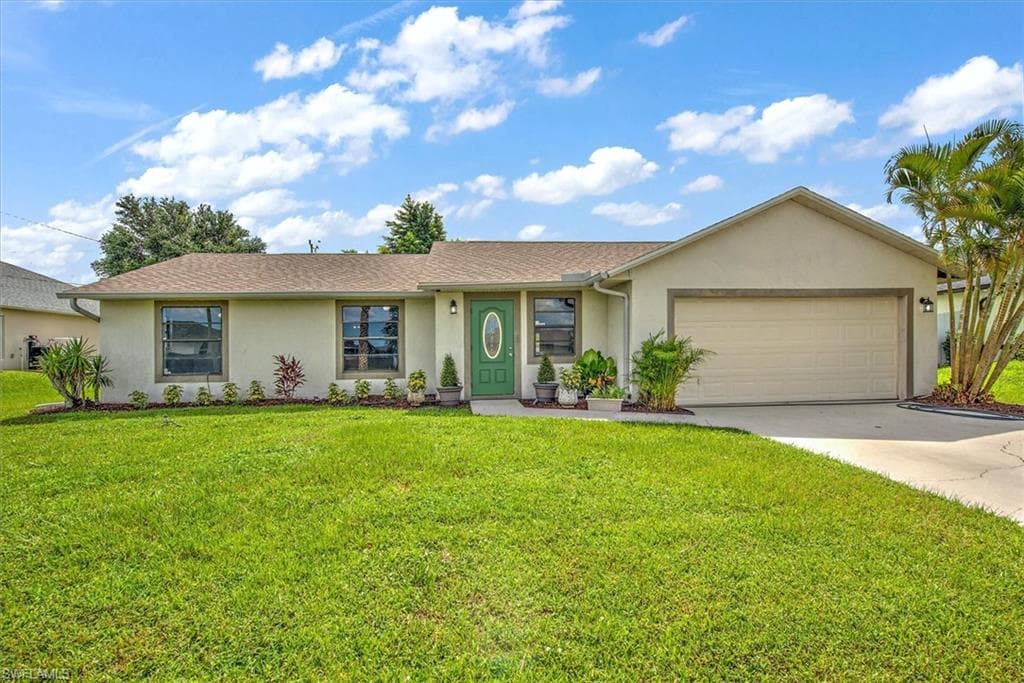 1407 NW 1st AVE CAPE CORAL, FL 33993
