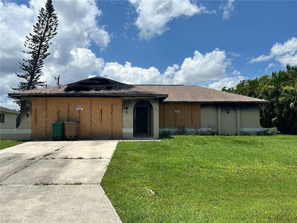 1722 NE 1st TER CAPE CORAL, FL 33909