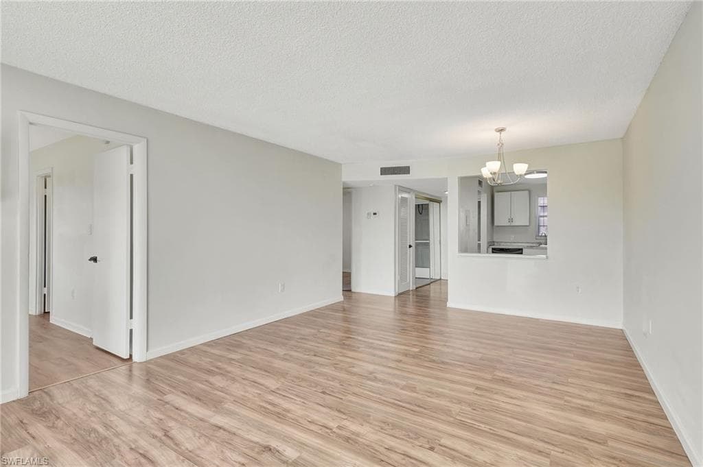 175 TURTLE LAKE CT 212 NAPLES, FL 34105