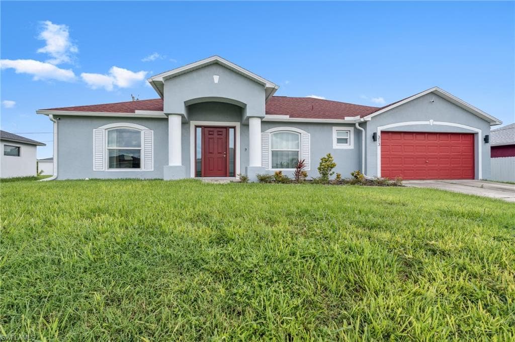313 NW 13th TER CAPE CORAL, FL 33993