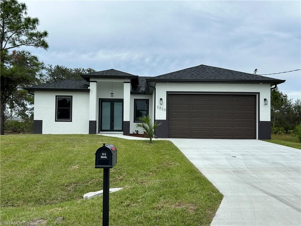 2820 52ND ST W LEHIGH ACRES, FL 33971