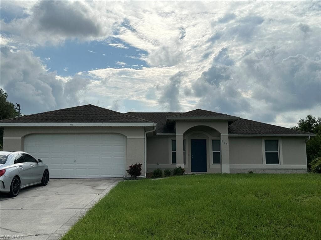 729 Burns AVE S LEHIGH ACRES, FL 33974