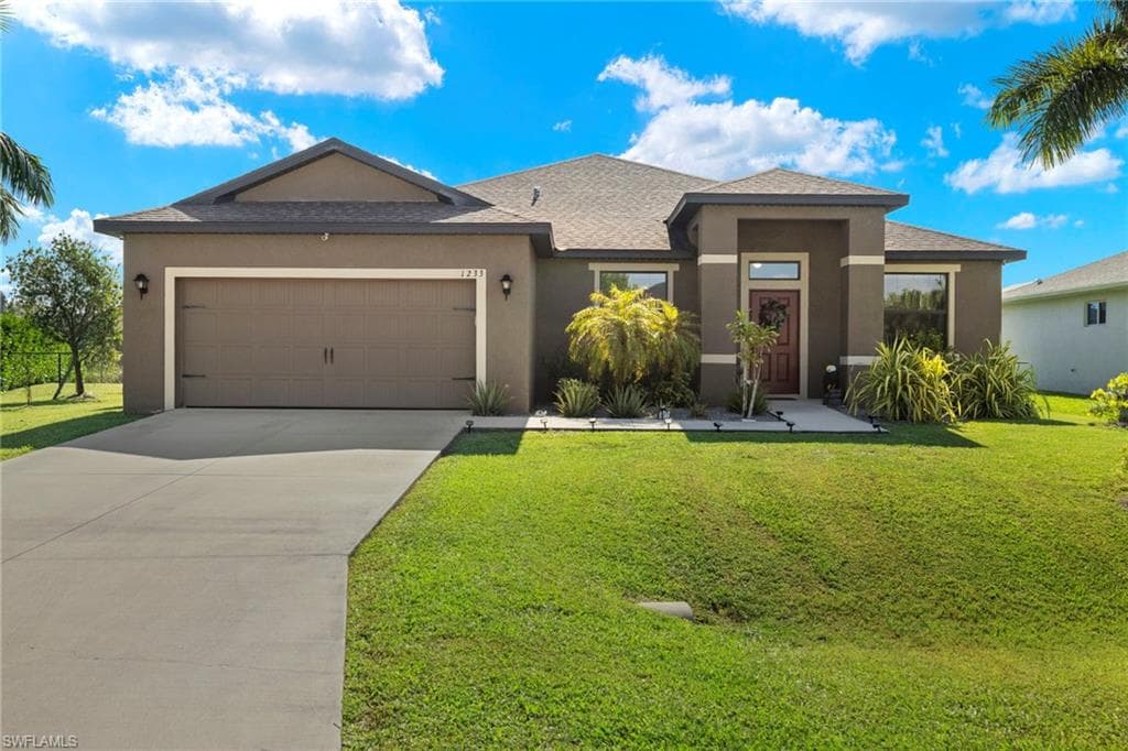 1233 SW 18th CT CAPE CORAL, FL 33991