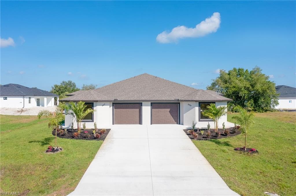 2437/2439 King AVE N LEHIGH ACRES, FL 33971