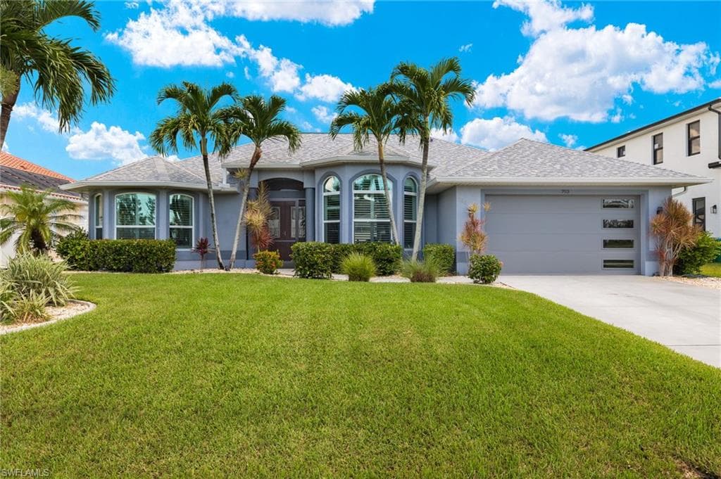703 NW 39th AVE CAPE CORAL, FL 33993