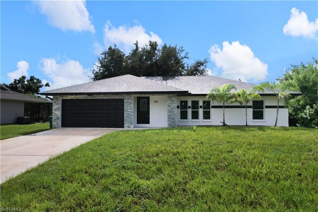 302 Millport ST NW PORT CHARLOTTE, FL 33948