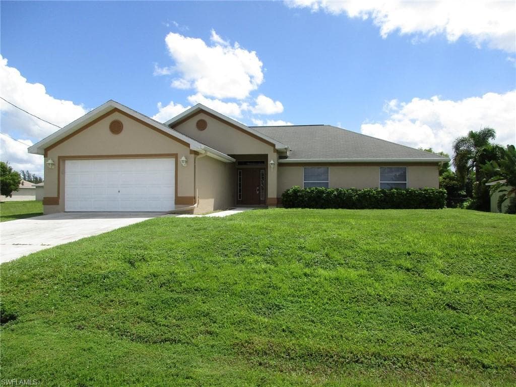 1221 NW 22nd PL CAPE CORAL, FL 33993