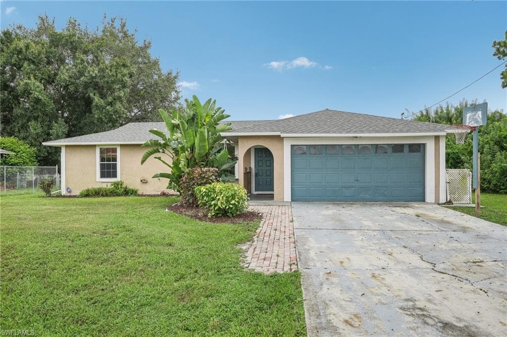 3109 13th ST W LEHIGH ACRES, FL 33971