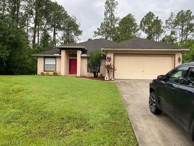 313 Vicksburg AVE LEHIGH ACRES, FL 33972