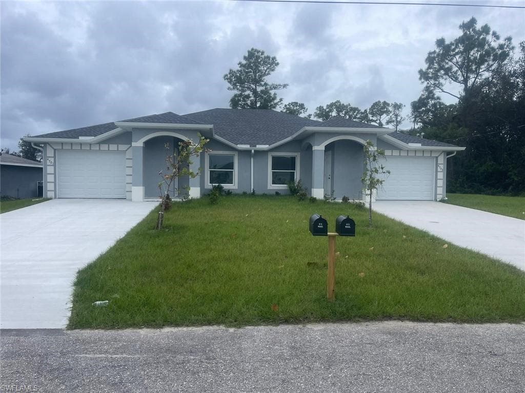 4701/4703 14th ST SW LEHIGH ACRES, FL 33973