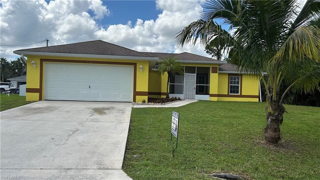703 W 7th ST LEHIGH ACRES, FL 33972