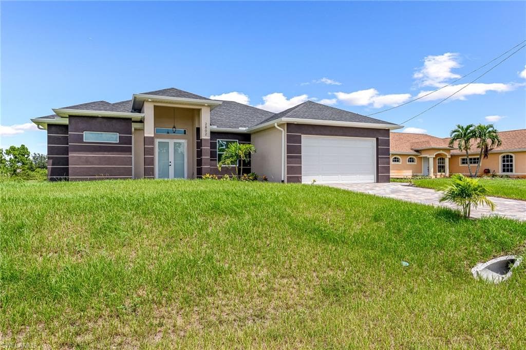 2802 14th ST SW LEHIGH ACRES, FL 33976