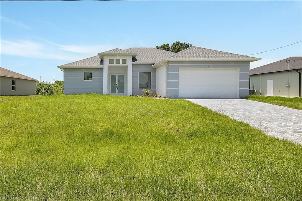 3209 24th ST SW LEHIGH ACRES, FL 33976