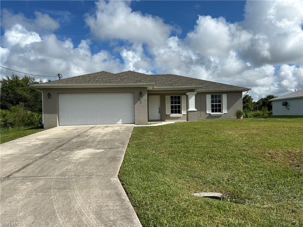 2916 25th ST W LEHIGH ACRES, FL 33971